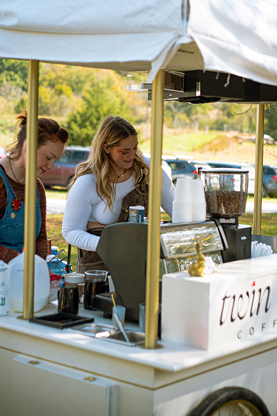 Claire Grace and Kendalynn DeVere, owners and operators of Nashville's Twin Rabbits Coffee Cart, serve specialty espresso drinks at an event in Smyrna, TN